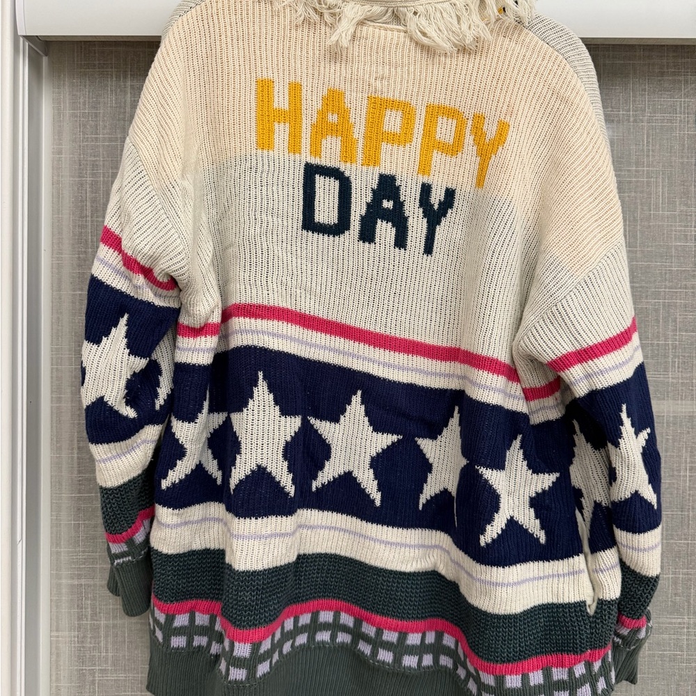 Peace Love World Cream and Pink Star Sweater